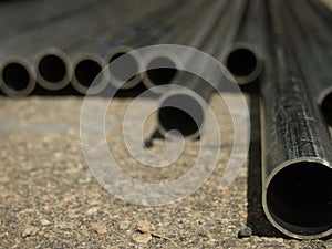 Stack of Many Pipes at the Construction Site