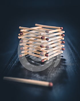 Stack of matches with a single match