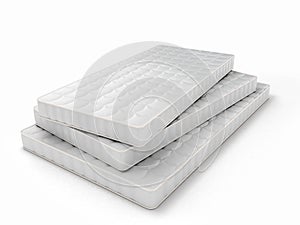 stack of mattresses of various sizes isolated on white background