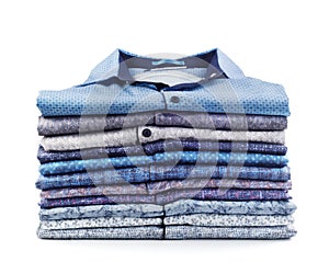 Stack of men`s shirts isolated