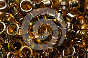 Stack of metal eyelets in close up