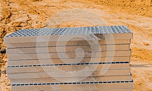 Stack of metal grate sections