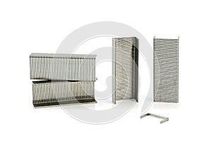 Stack of metal staples on white