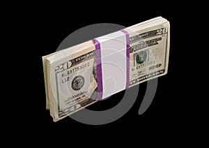 A stack of money on a black background