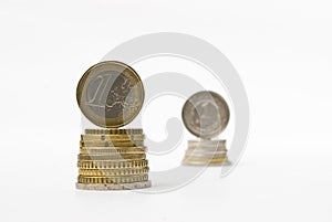 Stack of money euro and zloty coins. Currency rate comparison