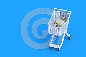 Stack of money in market cart. Heap of dollars. Copy space