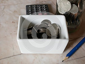 Stack of money, rows of coins for finance