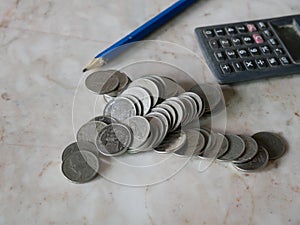 Stack of money, rows of coins for finance