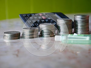 Stack of money, rows of coins for finance