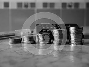 Stack of money, rows of coins for finance