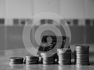 Stack of money, rows of coins for finance