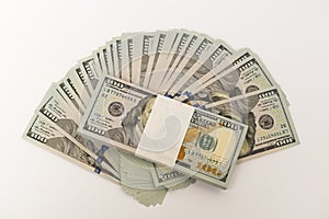 Stack of money in US dollars cash banknotes