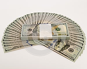 Stack of money in US dollars cash banknotes