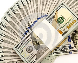 Stack of money in US dollars cash banknotes