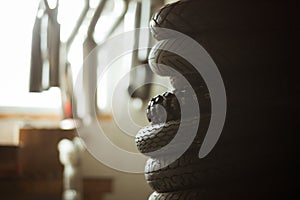 Stack of moto tires in garage