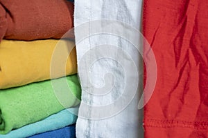 A stack of multicolored fabric without inscriptions.