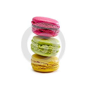 Stack of multicolored macaroon on a white background