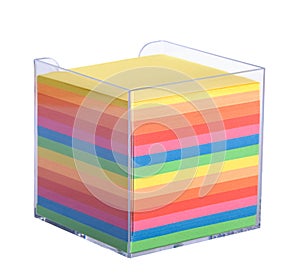 Stack of multicolored notes in a plastic box