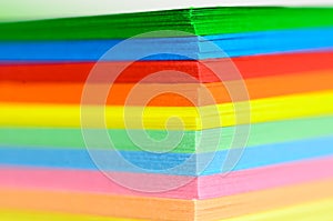 Stack of multicolored paper sheets