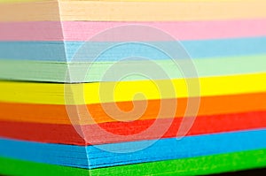 Stack of multicolored paper sheets