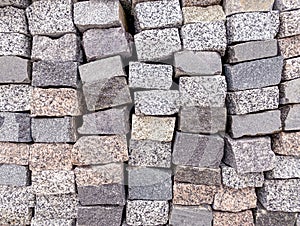 Stack natural granite stones for sidewalk construction. building material