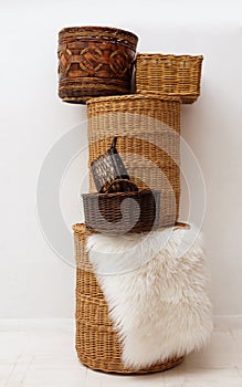 Stack of natural wicker straw cane bamboo baskets