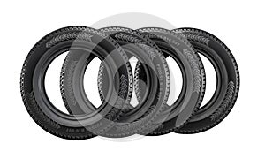 Stack of new car tires on white background