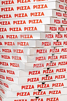 Stack of new cardboard pizza boxes
