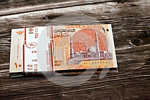 Stack of new first Egyptian 10 LE EGP ten pounds plastic polymer banknote features Administrative capital's grand mosque