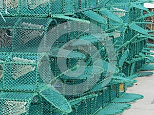 A Stack Of New Lobster Pots On A Harbour