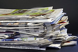 Daily stack of newspapers photo