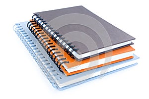 Stack of notebooks or copybooks on white background