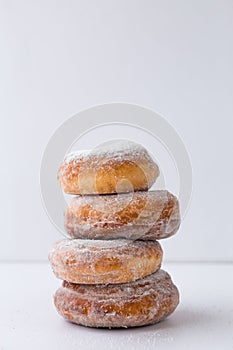 Stack ofdelicious donut isolated on white ackground photo