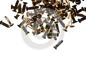 Stack of office supplies brass fasteners paper clips on