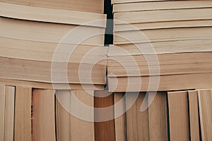 Stack of old books background. Many books on a pile. Books on vintage background.