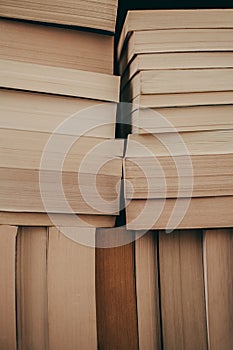 Stack of old books background. Many books on a pile. Books on vintage background.