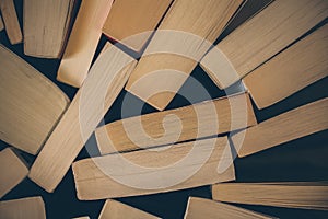 Stack of old books background. Top view of many books piled together. Education and wisdom.