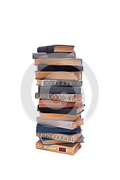 Stack of old books isolated on white background