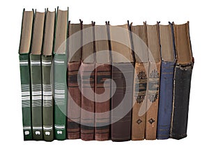 Stack of old books. Library shelf. The book is in a cloth cover. Vintage binding.