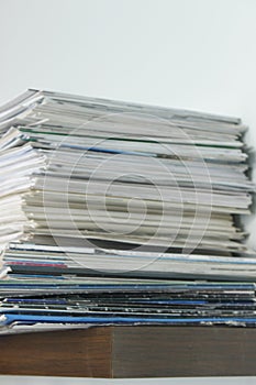 Stack of old books and magazines on a table- Close up