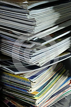 Stack of old books and magazines on a table- Close up