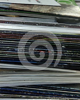 Stack of old books and magazines on a table- Close up