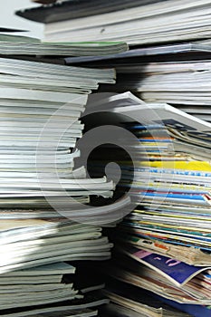 Stack of old books and magazines on a table- Close up