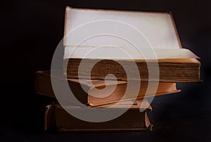 old books on black background