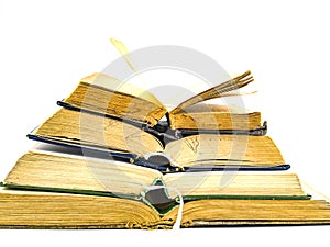 A stack of old books with place for text on a white background