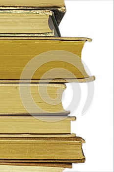 Stack of old books on white background