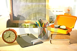 Stack of old books on wood desk