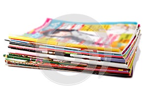 Stack of old colored magazines photo