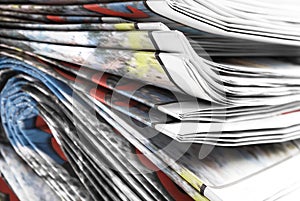 Stack of old folded newspapers