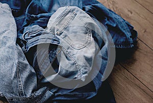 Stack of old jeans, ready for recycling. Zero waste Upcycle old denim garbage. Recycling old jeans